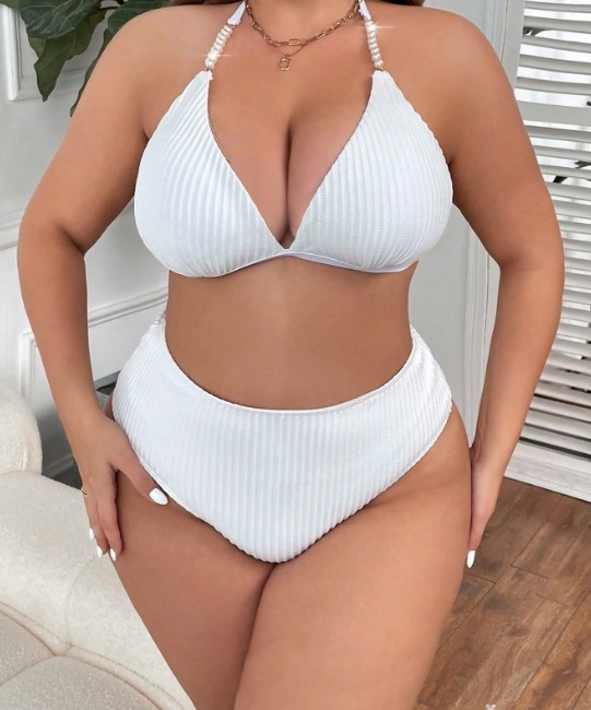 Bikini set s tankim trakama i otvorenim leđima, visokim strukom, s uloškom za grudni dio; materijal: najlon-elastan; podstava: poliester-elastan; težina 200 g