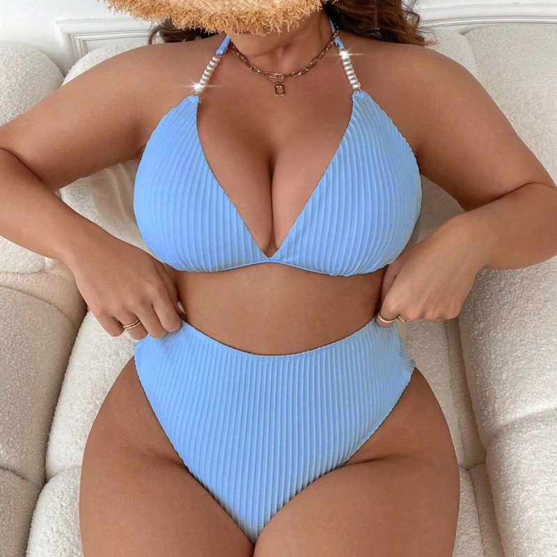 Bikini set s tankim trakama i otvorenim leđima, visokim strukom, s uloškom za grudni dio; materijal: najlon-elastan; podstava: poliester-elastan; težina 200 g