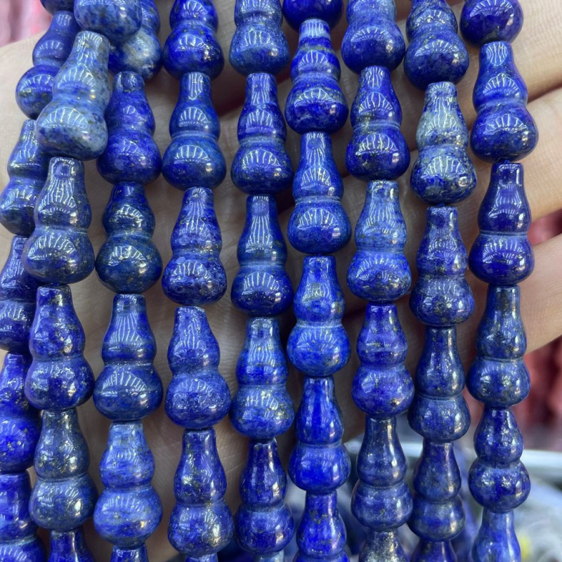 Perle za DIY nakit — agat, baroknog tikvasto oblika s motivom zmaja, izrezane i polirane.
