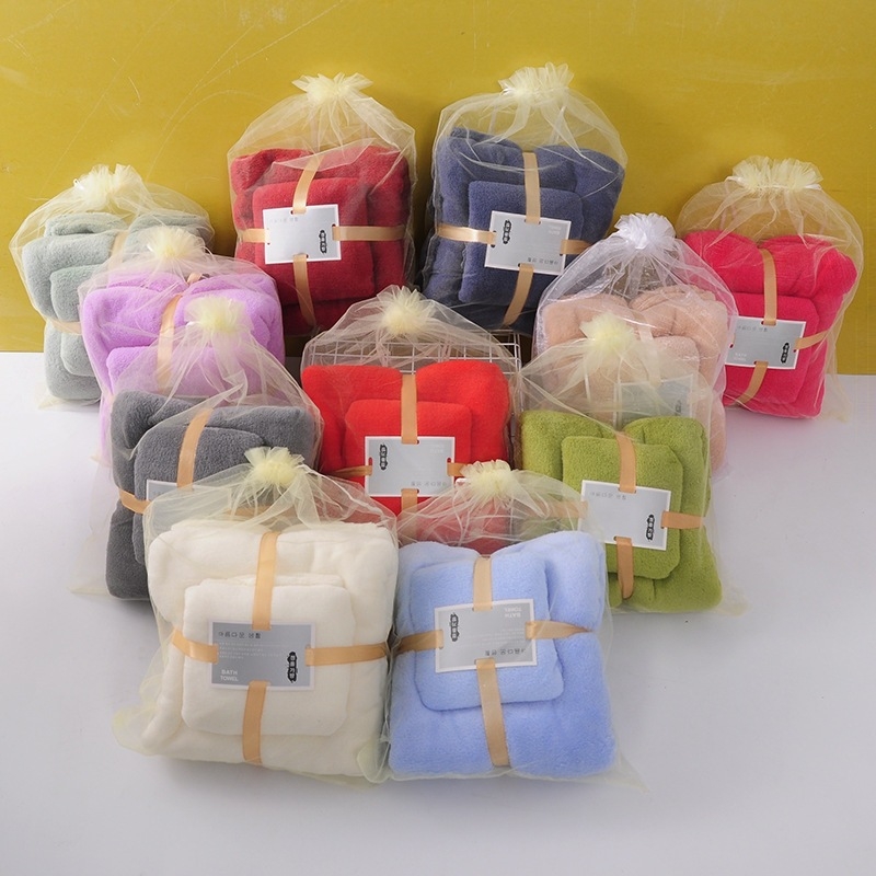 Anya- és gyerek törölközőkészlet korall-flízzel, vastag és puha, nedvszívó, szálmentes, ajándékdobozban (230 g/m², egyszerű szövés, logónyomtatás lehetséges).