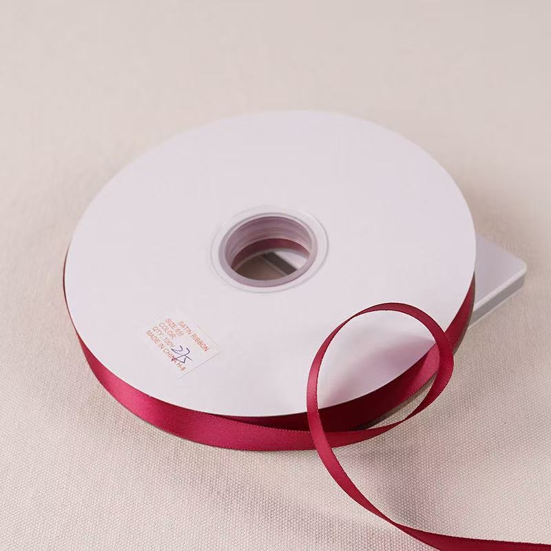 Polüesterist satiinlint kinkide pakkimiseks, bränd North of the Creek; sobib pulmadeks, jõulukaunistusteks ja DIY käsitööks.