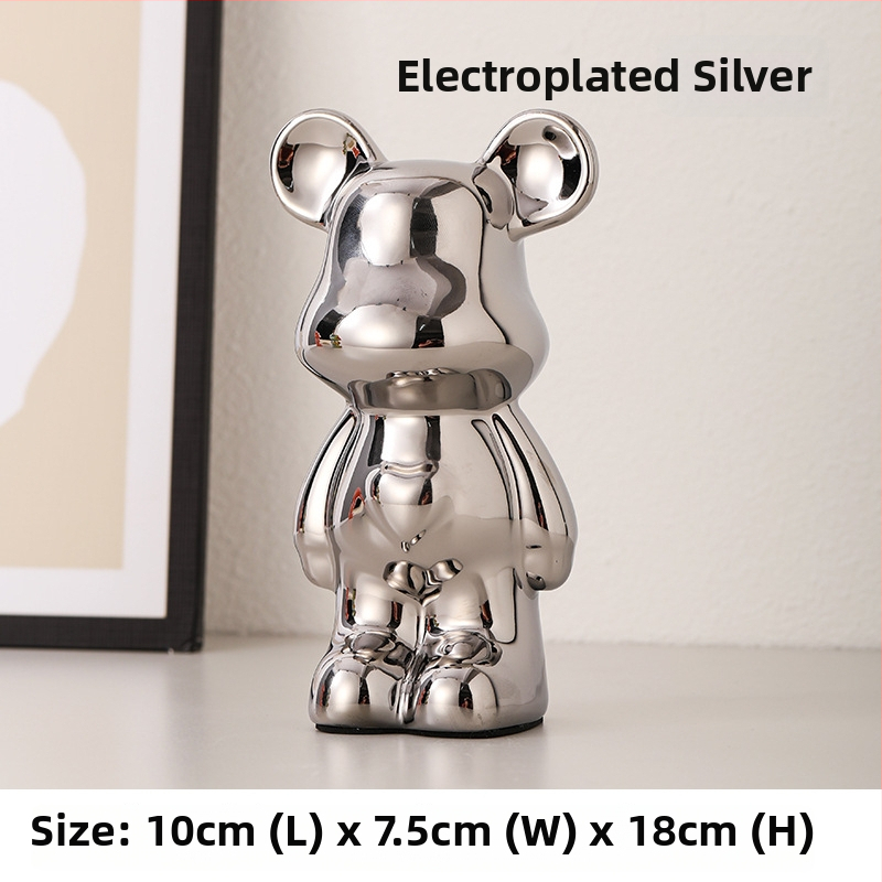 Keramička karikatura medvjedić figurica, monocromirano glazirani porculan, sladak stil, obična ambalaža.