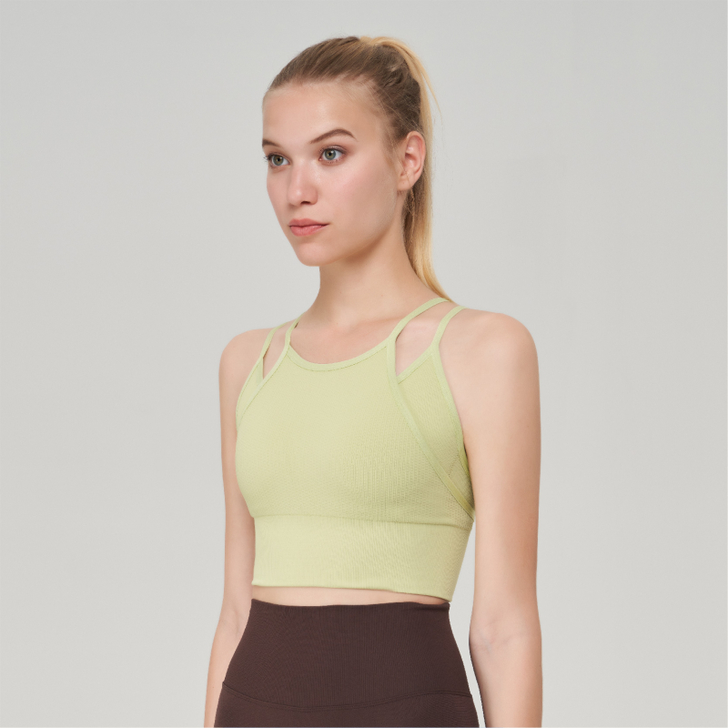 Sporta krūšturis-vestas treniņiem bezšuvju dizains - ārējais audums nylonammonija maisījums (92% neilons, 8% spandeksa oderes); pilnas krūšu formas kauss; moldēti kauss, augšdaļa plāna un apakšdaļa bieza; fiksētas dubultās siksnas; jacquard raksts