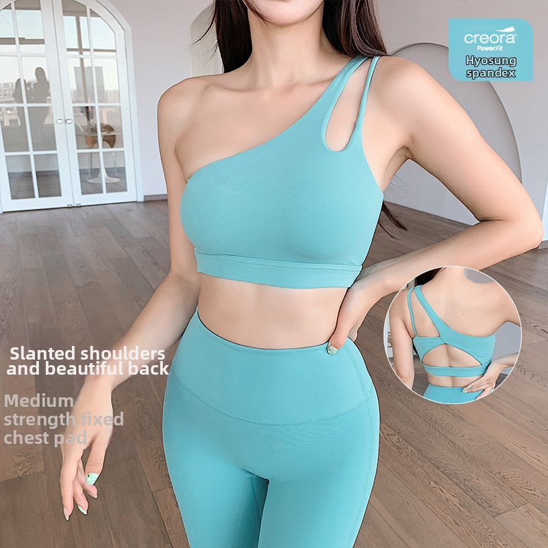 Sieviešu sporta krūšturis ar diagonālām plecu siksnām, push-up, pret noslīdējumu, seksīga mugura, jogai un fitnesam (Krūšu kupas tips: pilns; Kupas forma: plānas augšā, biezas lejā; Siksnas: fiksētas dubultās; Audums: nylon)