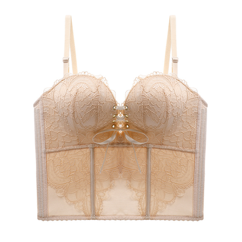 Bezšuvju veidojošs krūšturis kāzu kleitai — mežģīne uz neilona pamata, augšējie plānie un apakšējie biezāki veidojošie kausi, noņemamās dubultās siksnas, aizmugurē piecu rindu aizdare