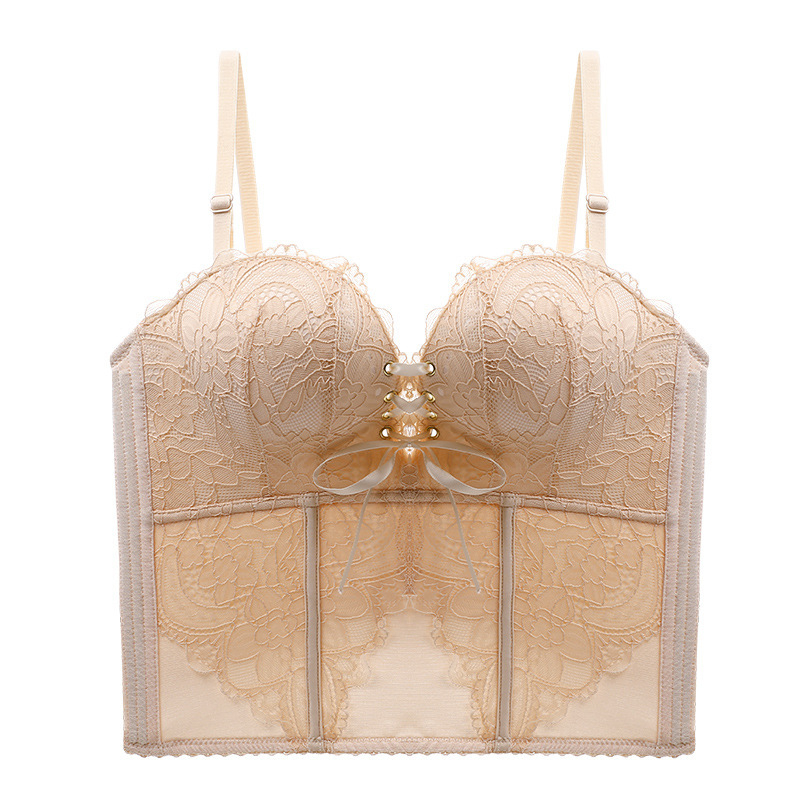 Bezšuvju veidojošs krūšturis kāzu kleitai — mežģīne uz neilona pamata, augšējie plānie un apakšējie biezāki veidojošie kausi, noņemamās dubultās siksnas, aizmugurē piecu rindu aizdare