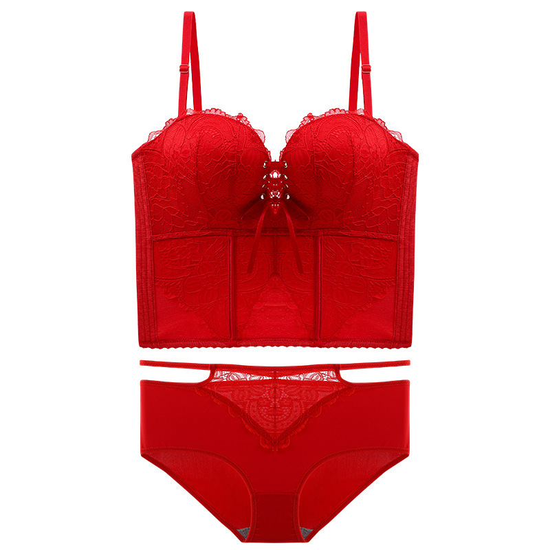 Bezšuvju veidojošs krūšturis kāzu kleitai — mežģīne uz neilona pamata, augšējie plānie un apakšējie biezāki veidojošie kausi, noņemamās dubultās siksnas, aizmugurē piecu rindu aizdare