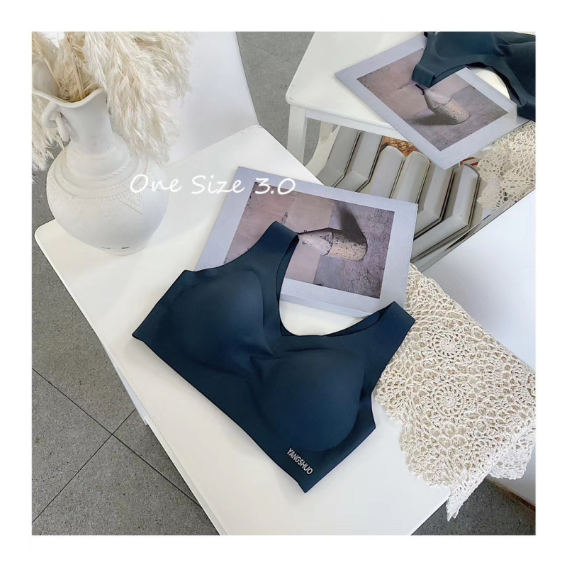 Sporta bustu topa bez šuvēm, elpojošs ar augšējo atbalstu, regulējamas siksnas; galvenais materiāls: nylon; odere: spandex.