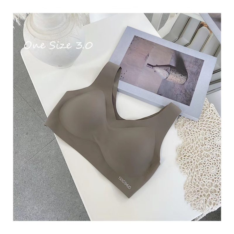 Sporta bustu topa bez šuvēm, elpojošs ar augšējo atbalstu, regulējamas siksnas; galvenais materiāls: nylon; odere: spandex.