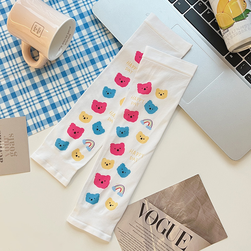 Gyerekeknek szóló UV-védő karvédő, monokróm jacquard mintázat, anyag: textil, 8–13 éveseknek