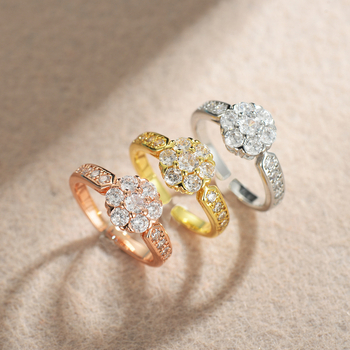 Női ékszerszett: virág motívum, keresztlánc, rézötvözet, elektroplattálás; tartalmaz nyakláncot, fülbevalót és karkötőt