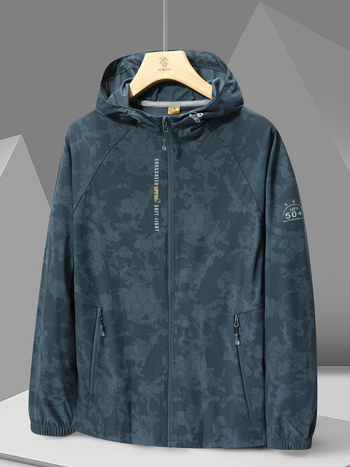 Ārējā vēja jaka 996 – universāla, UPF50+ UV aizsardzība, elpojoša un ļoti viegla, kamuflāžas modelis ar kapuci, poliesters