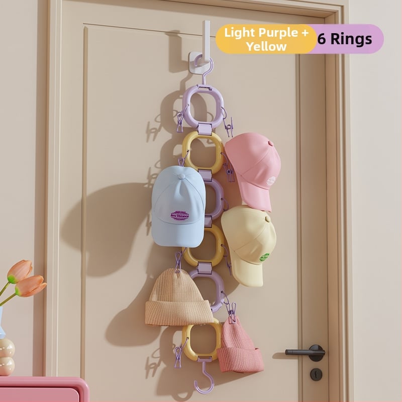 Cepuru turētājs ar klipu - plastmasas, saliekams, modelis 1, zīmols Orange Words