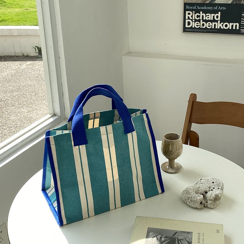 Kanvas tote kott, horisontaalne ruuduline kuju, avatud ülaosaga, sisemise telefoni tasku, kahe käepidemega