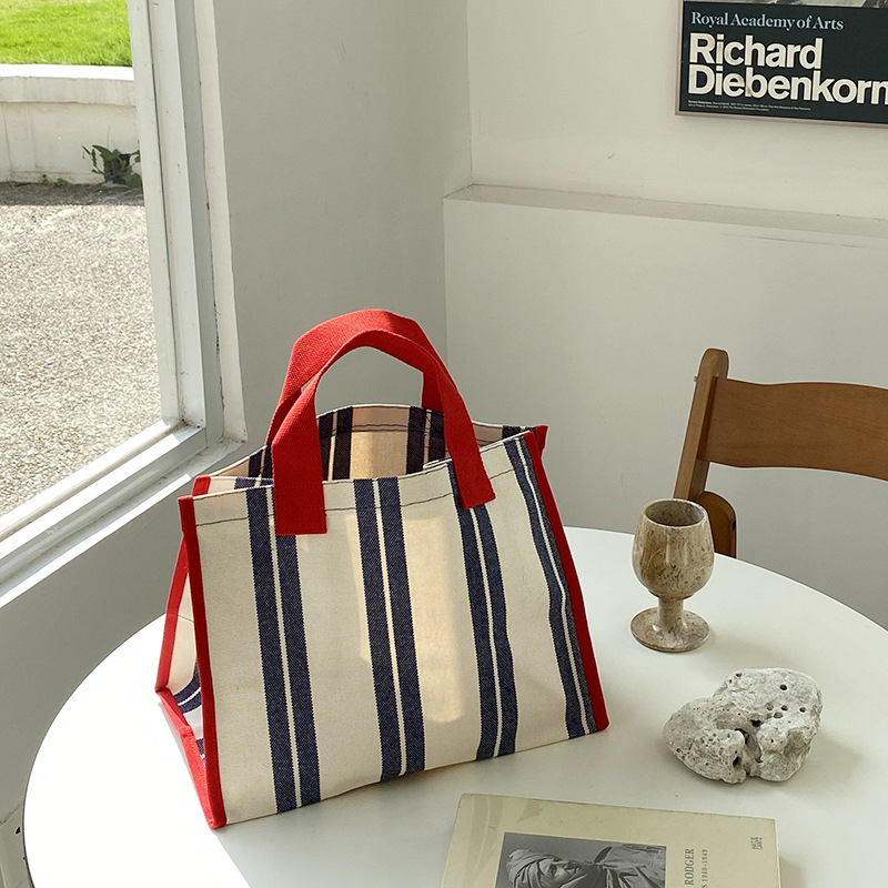 Kanvas tote kott, horisontaalne ruuduline kuju, avatud ülaosaga, sisemise telefoni tasku, kahe käepidemega