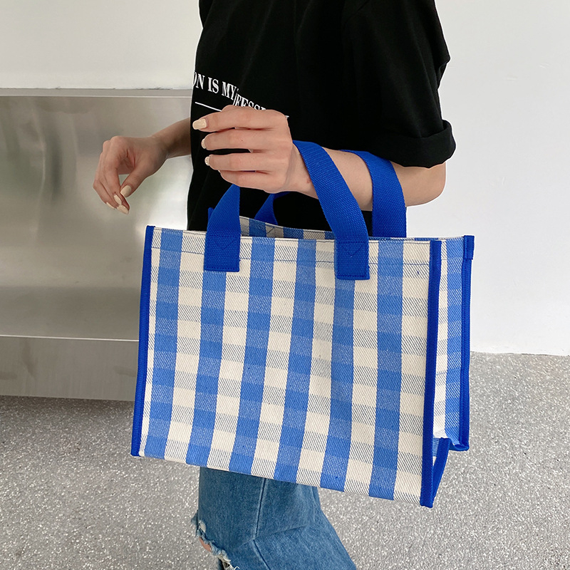 Kanvas tote kott, horisontaalne ruuduline kuju, avatud ülaosaga, sisemise telefoni tasku, kahe käepidemega