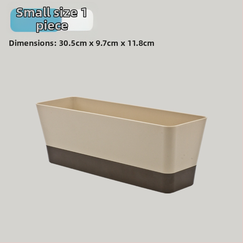 Plastikinis vazonas sukulentams, stovintis ant grindų, paprastas stilius, namų sodininkystei.