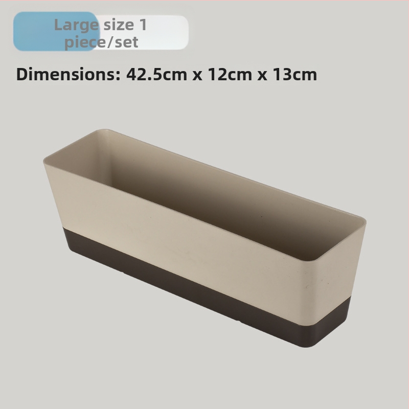 Plastikinis vazonas sukulentams, stovintis ant grindų, paprastas stilius, namų sodininkystei.