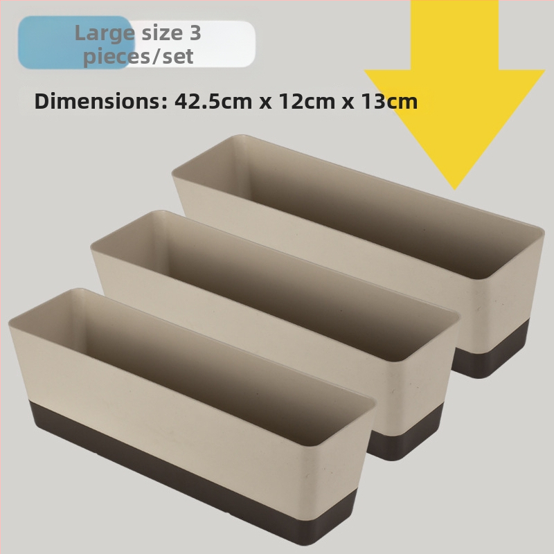 Plastikinis vazonas sukulentams, stovintis ant grindų, paprastas stilius, namų sodininkystei.