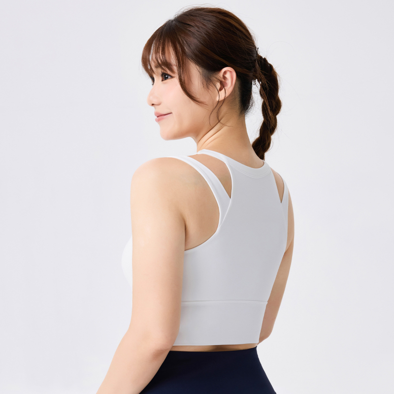 Joga krūšturis ar fiksētām kupām, glīts muguras dizains, cieša piegulšana; Materiāls: Nīlons 79% + Spandeks 21%; Audums: ķīmisko šķiedru maisījums; Garums: 40.5–41.7 cm