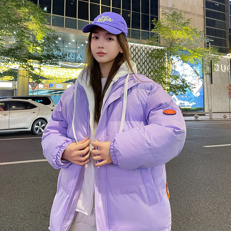 Uniszex pamut bélelt kapucnis kabát, derékig érő fazon, cipzáras zárás, külső poliészter anyag, bélés poliészter