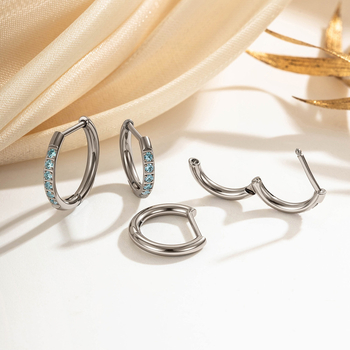 Халки от титаниева сплав, кръгли, обсипани с бели циркони, диамантено настилане