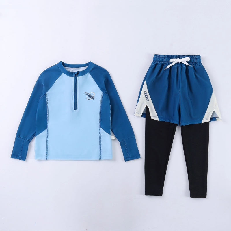 Berniukų dviejų dalių plaukimo komplektas su ilgomis rankovėmis ir ilgomis kelnių, saulės apsauga — poliesterio audinys 85%, poliesterio pamušalas 85%, svoris 150–300 g/m², plaukimui