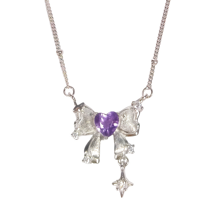 S925 ezüst masni alakú nyaklánc köves díszítéssel, többszintű keresztlánccal, szív alakú köves medállal