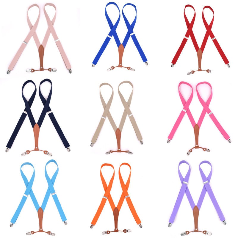 Unisex siksnas biksēm ar 4 klipšiem, regulējams garums, elastīgas, poliestera un elastāna maisījumums, krustveidīgs aizmugures dizains