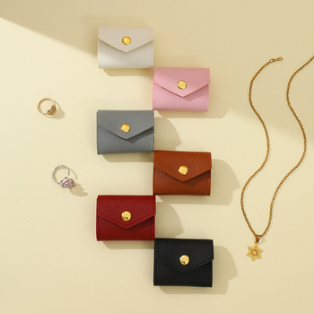 Geantă mini pentru depozitare bijuterii din piele, design rulă — husă de protecție pentru călătorii, pentru cercei și inele