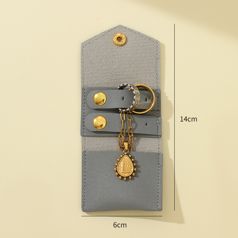 Geantă mini pentru depozitare bijuterii din piele, design rulă — husă de protecție pentru călătorii, pentru cercei și inele