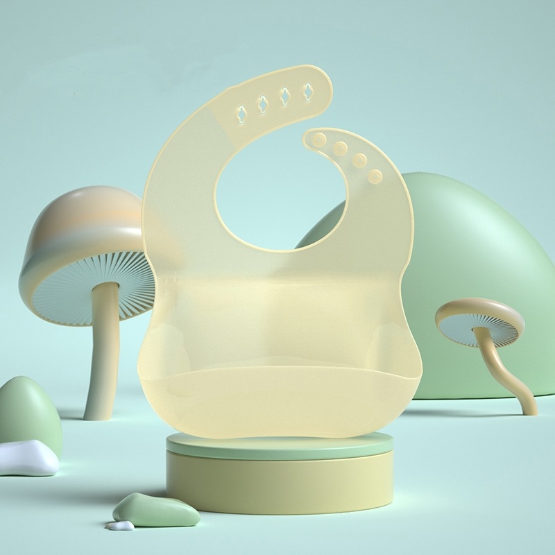 Szilikonból készült baba etető kötény – vízálló, ultra puha, rajzfilmszimbával, 1–3 éveseknek