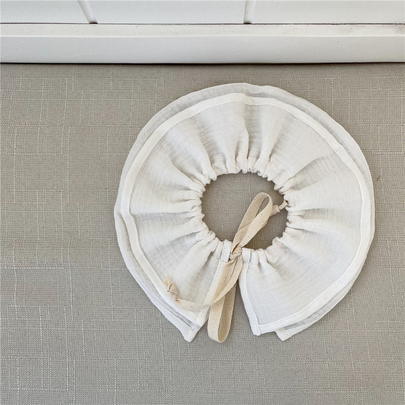 Csecsemő bavetta – 95% pamutból, 360° védelem a hányás ellen, állítható kötő, nedvszívó