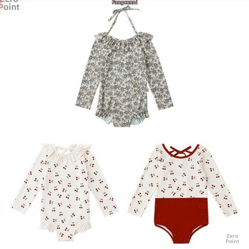 Mergaitėms: atviros nugaros viengabalis maudymosi kostiumėlis, karikatūrų raštas, amžius 0-8 metų, audinys: nailonas su elastanu