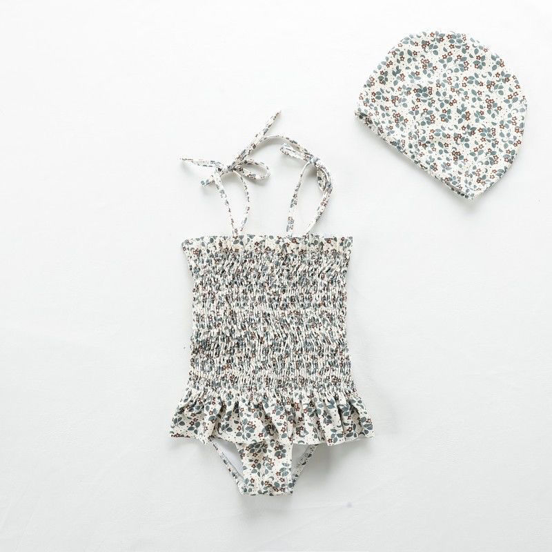 Mergaitėms: atviros nugaros viengabalis maudymosi kostiumėlis, karikatūrų raštas, amžius 0-8 metų, audinys: nailonas su elastanu