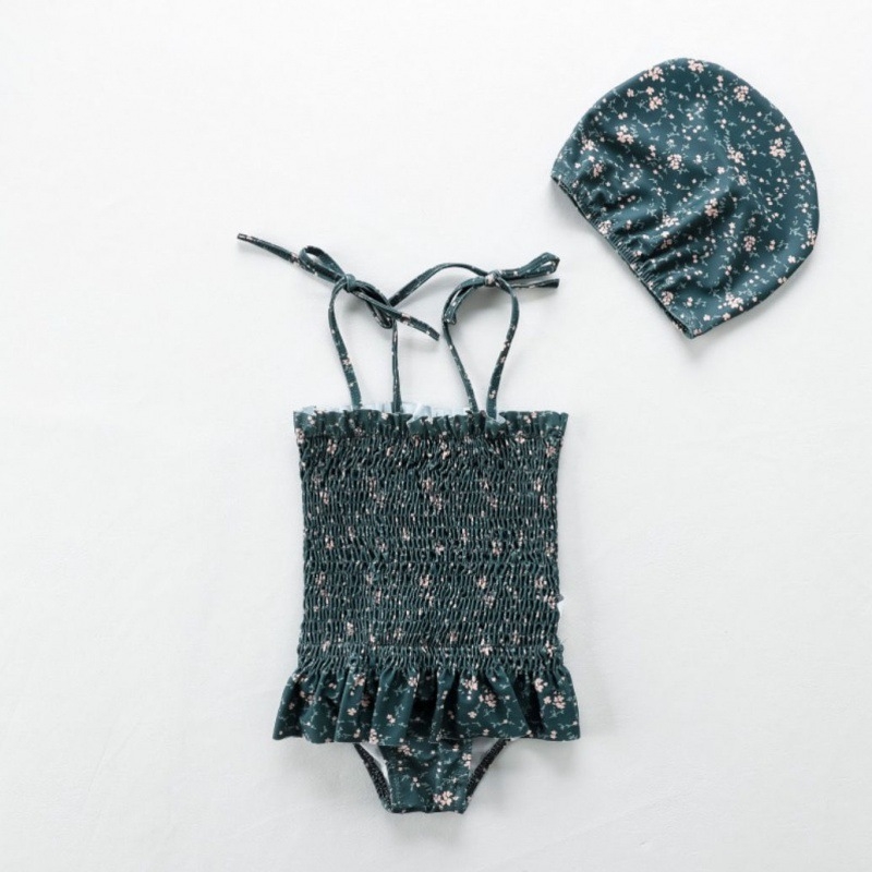 Mergaitėms: atviros nugaros viengabalis maudymosi kostiumėlis, karikatūrų raštas, amžius 0-8 metų, audinys: nailonas su elastanu