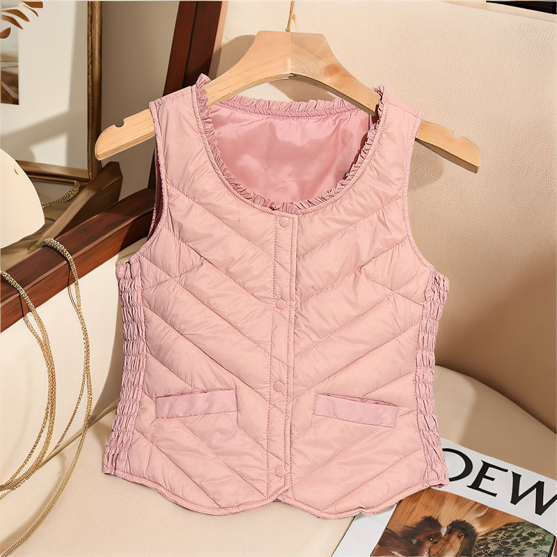 Sieviešu ultra īsa dūnu veste, bez piedurknēm, pildījums baltais pīļu dūns 81–85%