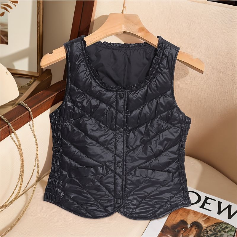 Sieviešu ultra īsa dūnu veste, bez piedurknēm, pildījums baltais pīļu dūns 81–85%