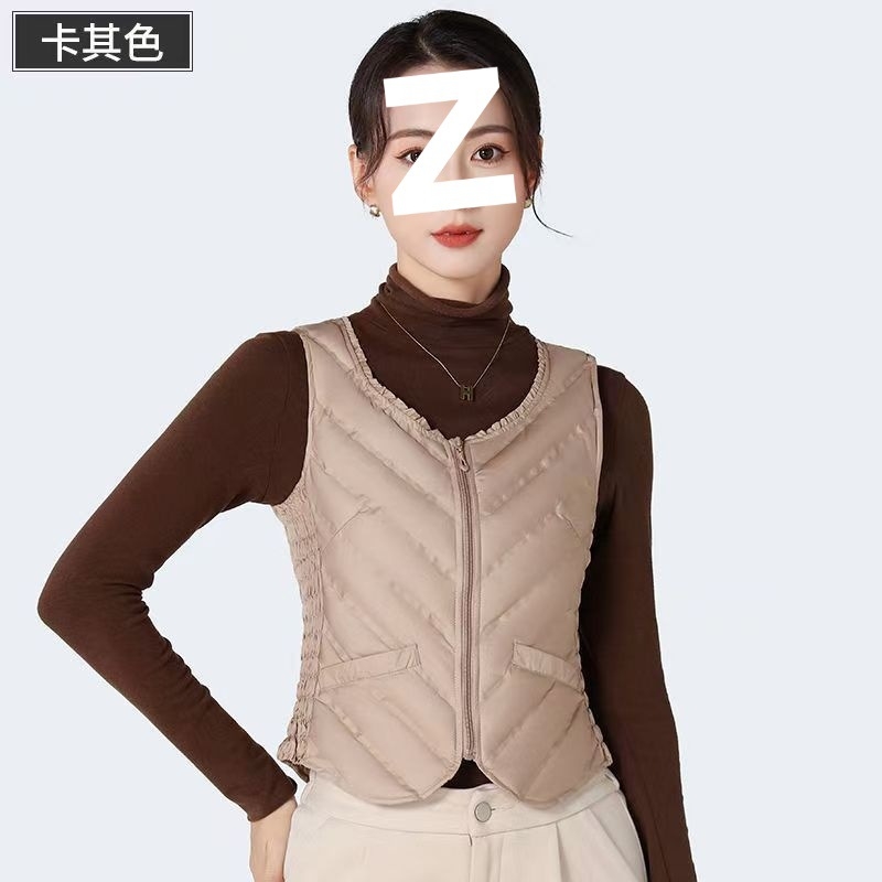 Sieviešu ultra īsa dūnu veste, bez piedurknēm, pildījums baltais pīļu dūns 81–85%