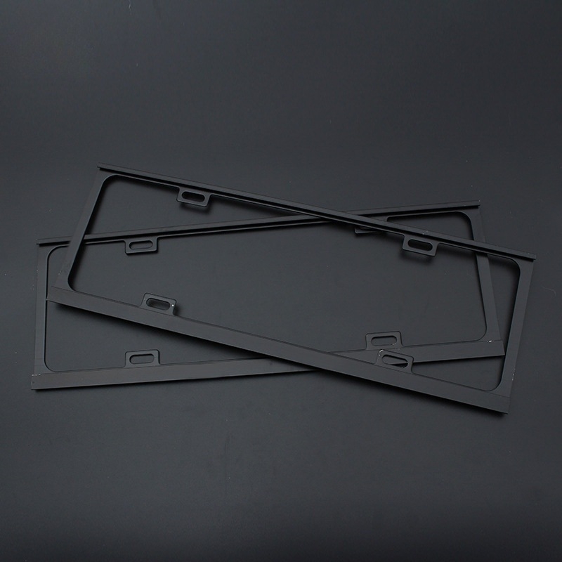 Ramă pentru plăcuța de înmatriculare din aliaj de magneziu, finisaj sablare și oxidare; compatibil cu toate modelele interne; greutate 210 g