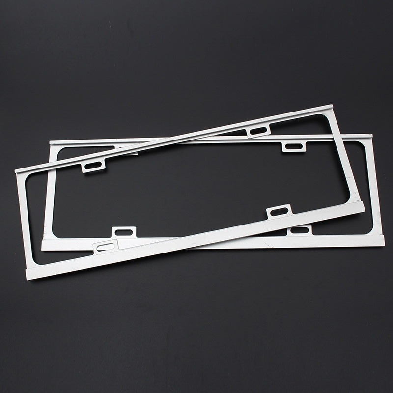 Ramă pentru plăcuța de înmatriculare din aliaj de magneziu, finisaj sablare și oxidare; compatibil cu toate modelele interne; greutate 210 g