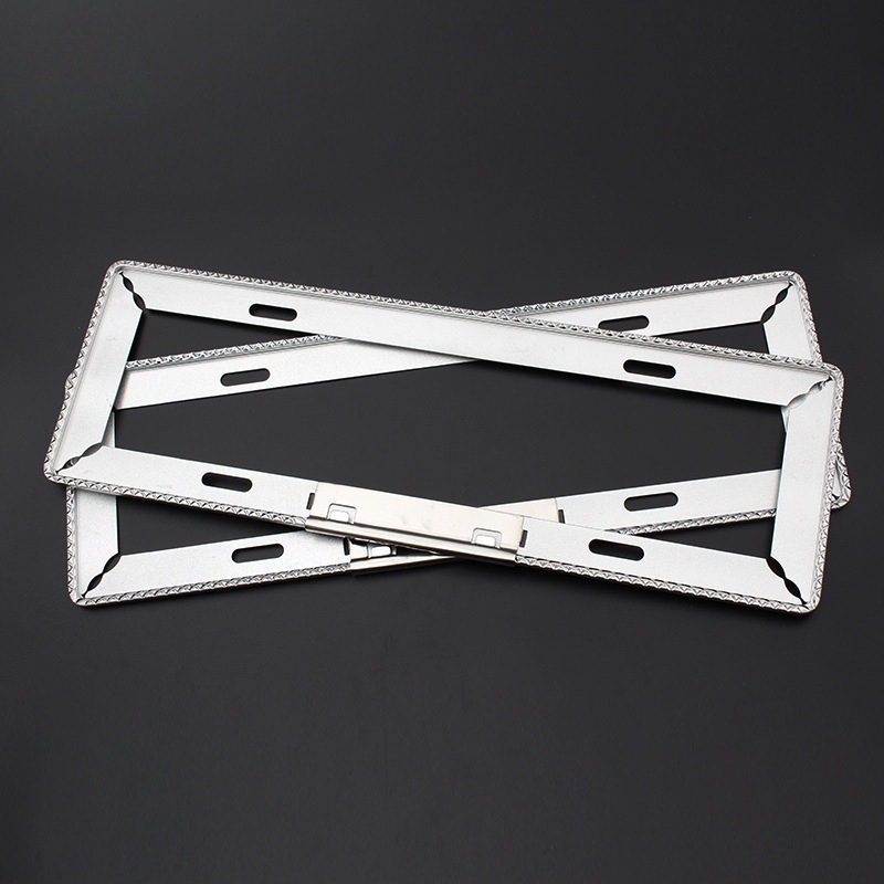 Ramă pentru plăcuța de înmatriculare din aliaj de magneziu, finisaj sablare și oxidare; compatibil cu toate modelele interne; greutate 210 g