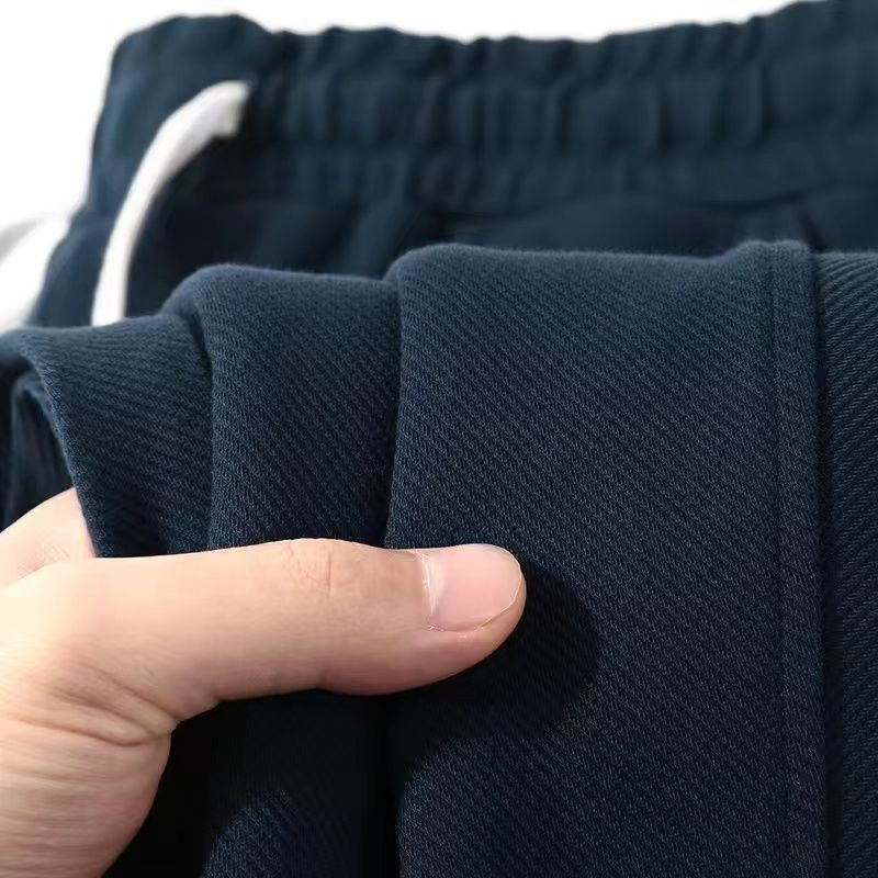 Vīriešu rudens-ziemas brīva piegriezuma sporta bikses ar taisnu piegriezumu, viduklis vidējā, bieza auduma, bambusa šķiedras, elpojošas (viduklis; bieza auduma; bambusa šķiedras; elpojošas)