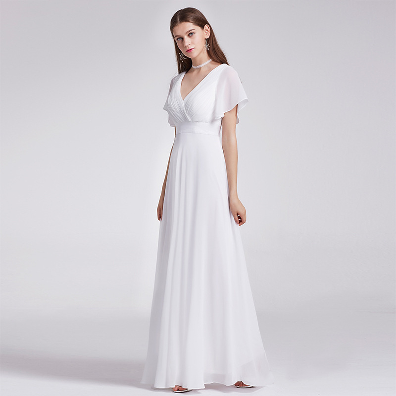 Rochie de seară lungă în croială A-line, talie înaltă, mâneci trei sferturi, lungă fustă, material acetat și poliester (70–80%)