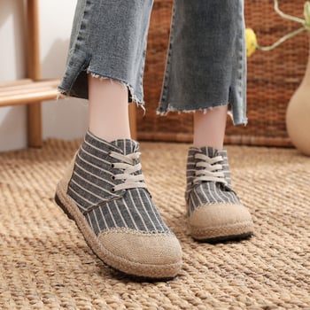 Naiste Pekingi audekli jalanõud tikandiga, sisistus kunstliku lühikese karusnahaga, etnilise stiiliga, ülemine materjal kanvas, tald veiseliha kõõluse, ümargune varvas, lame kand