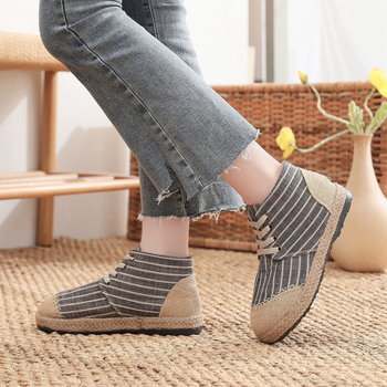 Naiste Pekingi audekli jalanõud tikandiga, sisistus kunstliku lühikese karusnahaga, etnilise stiiliga, ülemine materjal kanvas, tald veiseliha kõõluse, ümargune varvas, lame kand