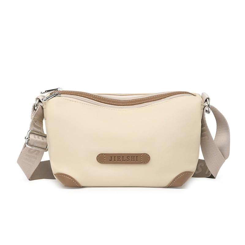 Nailona plecu soma, vertikāla kvadrāta forma, rāvējslēdzēja aizdare, iekšējās kabatas (ar rāvējslēdzēja kabatu, telefona kabatu, ID kabatu)