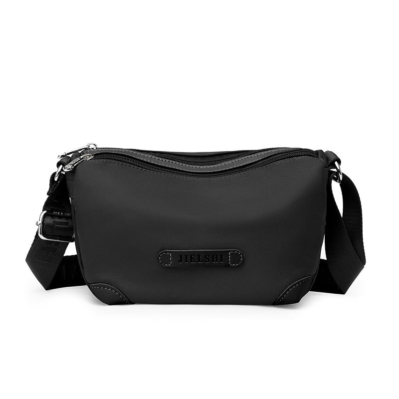 Nailona plecu soma, vertikāla kvadrāta forma, rāvējslēdzēja aizdare, iekšējās kabatas (ar rāvējslēdzēja kabatu, telefona kabatu, ID kabatu)