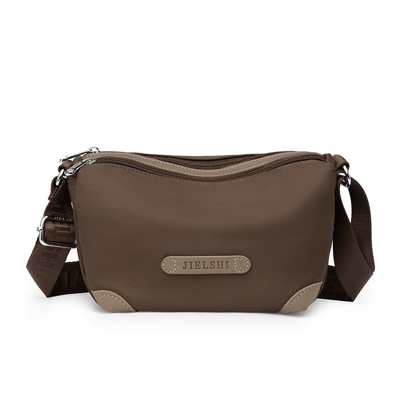 Nailona plecu soma, vertikāla kvadrāta forma, rāvējslēdzēja aizdare, iekšējās kabatas (ar rāvējslēdzēja kabatu, telefona kabatu, ID kabatu)