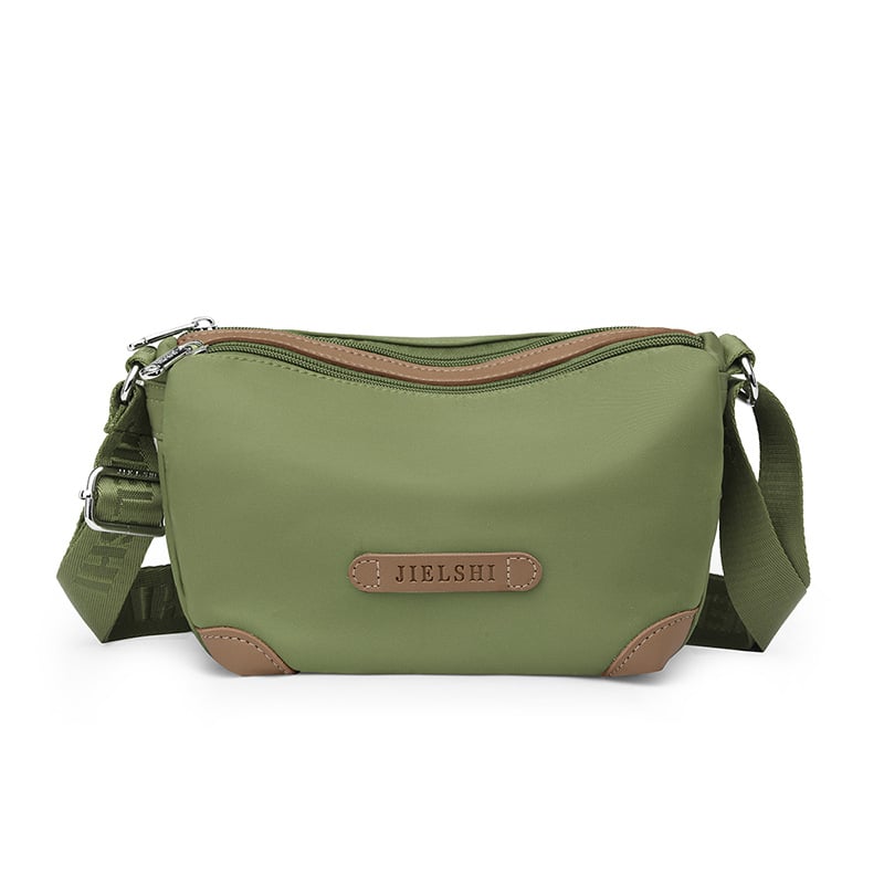 Nailona plecu soma, vertikāla kvadrāta forma, rāvējslēdzēja aizdare, iekšējās kabatas (ar rāvējslēdzēja kabatu, telefona kabatu, ID kabatu)